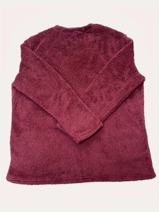 Detail of soft burgundy fleece fabric and round neck design on casual long sleeve top