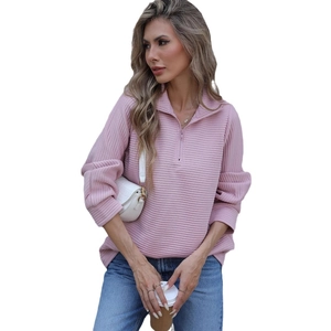 Pink long sleeve quarter-zip pullover sweatshirt with waffle texture and stand collar