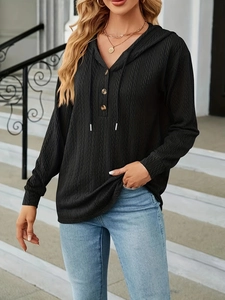 Women's black textured drawstring hoodie with V-neck button detail and long sleeves