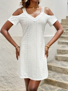 White eyelet mini dress with V-neck, cold-shoulder sleeves and boho embroidery detail