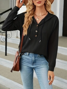 Women's black textured long sleeve hoodie with button neckline and drawstring details
