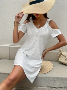 White eyelet embroidery cold-shoulder V-neck mini dress for a chic summer vacation look