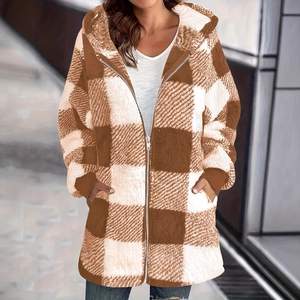 Detail of hooded plush coat featuring brown plaid pattern, metal zipper and side pockets