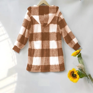 Close-up of plush plaid hooded jacket with ribbed cuffs and soft flannel texture