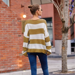 Back view of a striped oversized knit sweater with wide white and mustard green panels