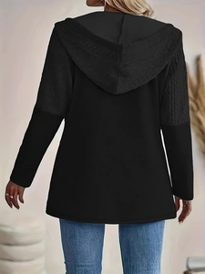 Women's black hooded jacket with textured shoulder panels and casual loose fit