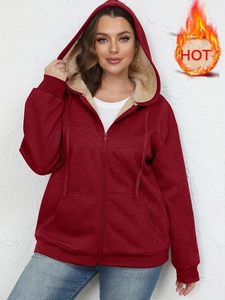 Women's burgundy zip-up hoodie with warm beige sherpa lining and drawstring hood