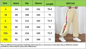 Detailed size chart for women's casual trousers with side stripe colorful embroidery