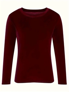 Close-up of long sleeve velvet top in burgundy featuring a classic round neckline