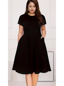 Classic black short-sleeve A-line dress with crew neck and practical side pockets