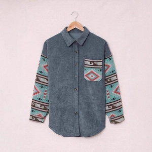 Detail of corduroy texture and ethnic geometric print on the sleeve and pocket of the shirt