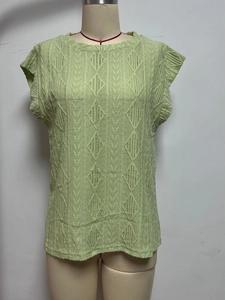 Gilet en tricot vert clair pour femme avec motif à losanges et col rond élégant