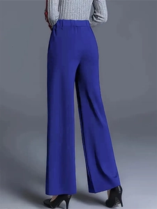 Women's royal blue high waist wide leg trousers with professional drape and elastic waist