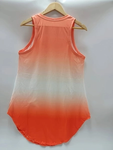 Detail of sleeveless gradient mini dress with orange ombré effect and curved hemline