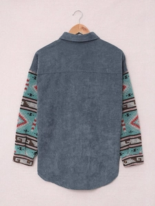 Men's corduroy shirt in dusty blue with Aztec patterned long sleeves and a curved hem