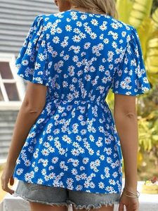 Back view of summer floral V-neck shirt with daisy print and ruffled short sleeves