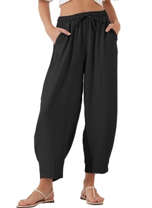 Detail view of high waist loose casual pants with drawstring and functional pockets