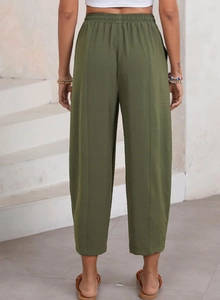 Detailed back view of high waist army green wide leg pants with central seam and elastic waist