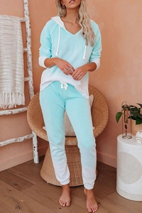 Women's gradient knit loungewear set featuring blue tie-dye hoodie and matching joggers