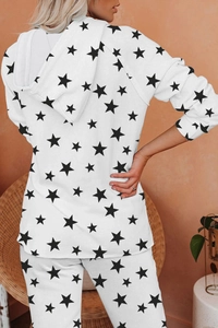 Detail of white star print hooded tracksuit loungewear set on a female model