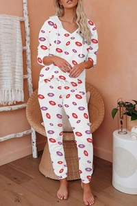 Detail view of women's white lounge set with pink lip print hoodie and drawstring pants