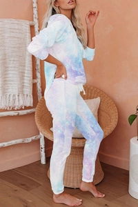 Detail view of tie-dye starry sky print pajamas set with hooded sweatshirt and trousers