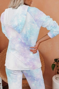 Detail of blue and purple galaxy tie-dye hooded loungewear set with star print