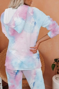 Detail of pink and blue tie-dye gradient knit hoodie set showing back view and fabric texture