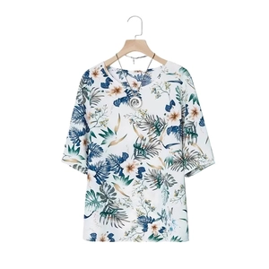 Women's summer floral print round neck blouse with tropical patterns on white background