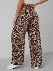 Detailed back view of high-waisted leopard print wide-leg pants with elastic waistband