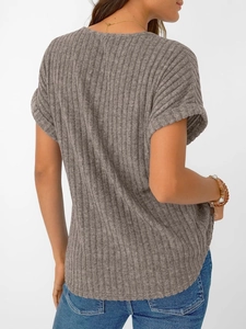 Detail view of grey ribbed V-neck T-shirt with rolled sleeves and vertical texture
