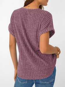 Detail of purple ribbed knit v-neck t-shirt fabric texture and sleeve roll detail