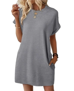 Detailed macro view of gray short-sleeve dress showing textured knit fabric and side pockets