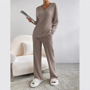 Women's two-piece knit lounge set with V-neck long sleeve top and wide-leg ribbed trousers