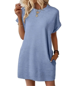 Detail view of light blue crinkle fabric texture on loose round neck short sleeve dress