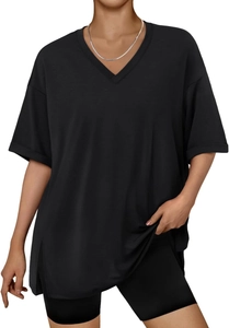 Detail view of black V-neck short sleeve top with side slits and soft draping fabric