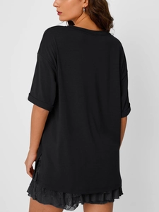 Detail of black V-neck t-shirt back featuring delicate lace trim on the hemline