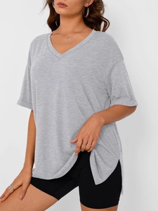 Detail of heather grey V-neck short sleeve T-shirt with side slit and curved hemline