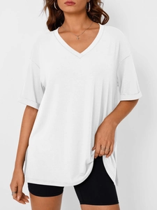 Detailed view of women's white V-neck T-shirt showing side slit and rolled sleeve cuffs