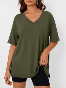 Detail of olive green V-neck T-shirt showing side slits and rolled cuff sleeves