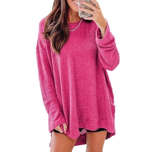Maglia da donna rosa acceso in maglia a nido d'ape con maniche lunghe e vestibilità ampia