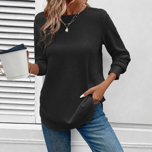 Women's black long sleeve waffle knit sweatshirt with crew neck in casual loose fit