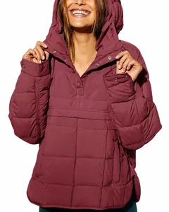 Detail of burgundy quilted pullover with snap collar and large front pocket