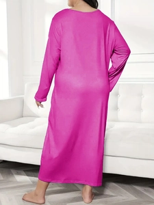 Rear view of long sleeve magenta lounge dress with butterfly and leopard heart prints