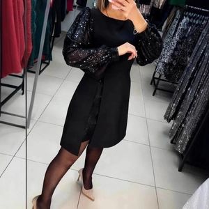 Elegant black mini dress with sequined lantern sleeves and a slim fit silhouette