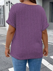 Detail of the purple ribbed texture and back view of a loose V-neck short sleeve top