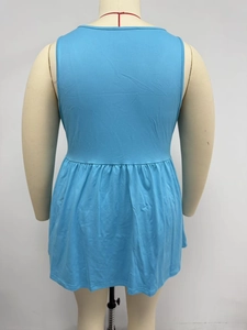 Detail view of the light blue plus size sleeveless top with ruffle hem and u-neck design