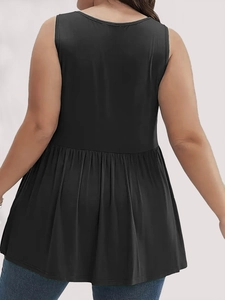 Rear view of black sleeveless peplum top featuring pleated hem and crew neck design