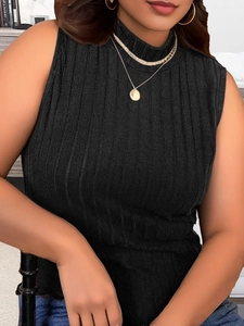 Close-up of black ribbed sleeveless high-neck top with slim-fit knit texture detail