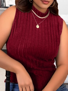Detail view showing the ribbed knit texture and high neck of this burgundy sleeveless top
